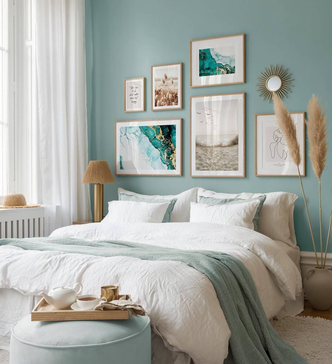 bedroom blue wall and art prints nordroom The Color Trends for 2025: Warm, Natural Shades and a Cheerful Accent