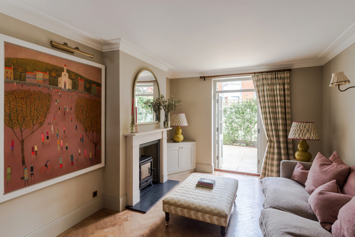 beige sitting room large pink artwork
