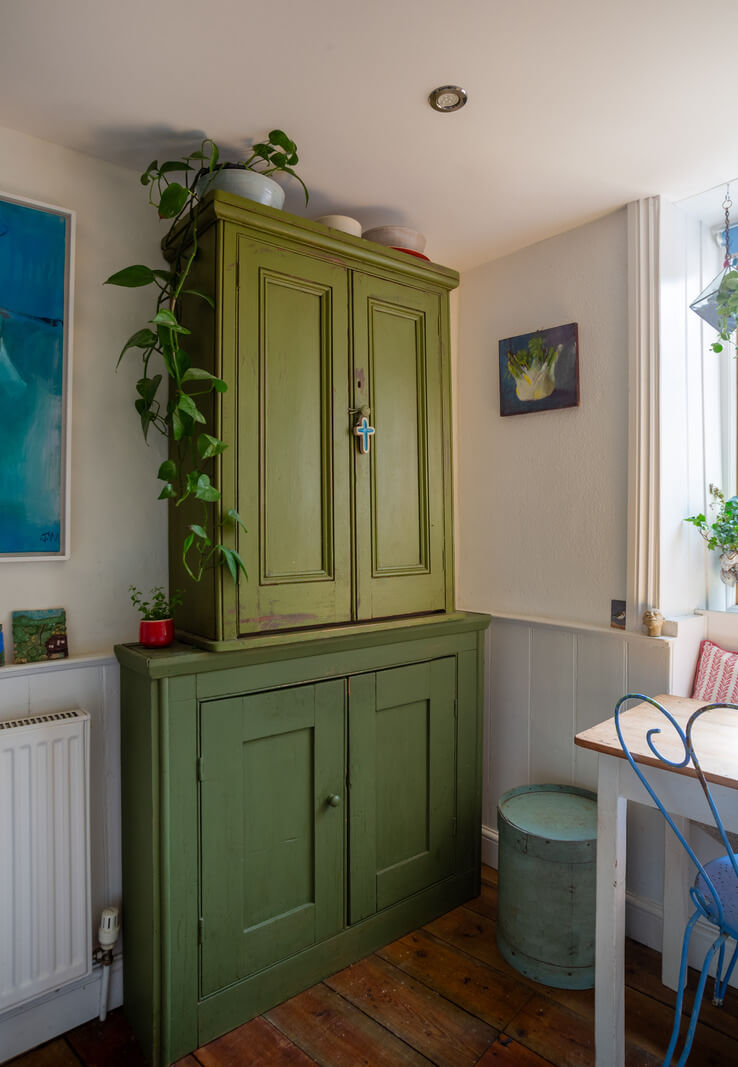 green cabinet A Charming 400-Year-Old Cottage in England