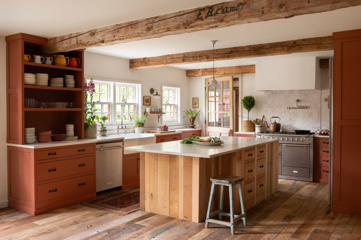 kitchen with terracotta colored cabinets butler sink