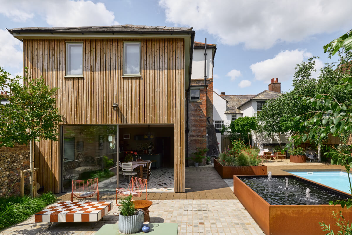 modern extension and garden with swimming pool