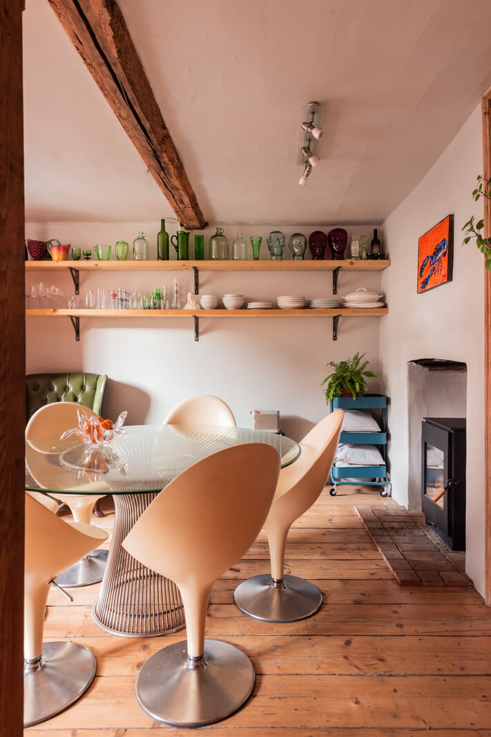round dinng table shelves wooden floor exposed beam nordroom