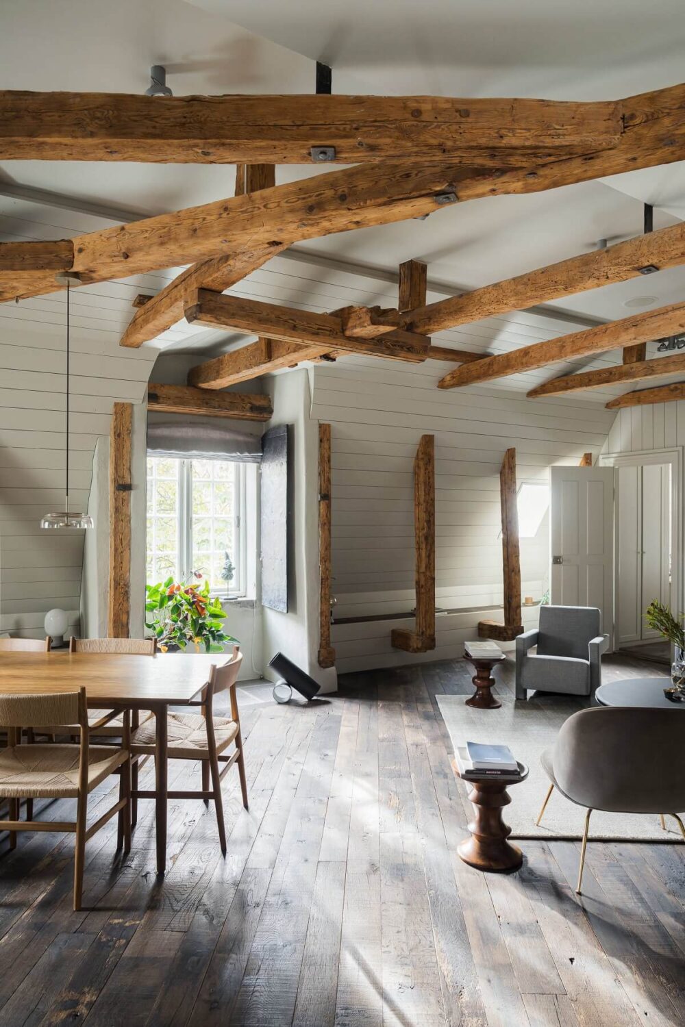 scandinavian penthouse exposed wooden beams