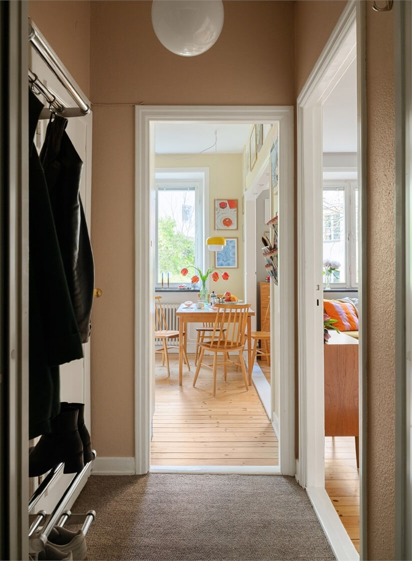 small carpeted hall Midcentury Design and Colorful Decor in a Charming Studio Apartment