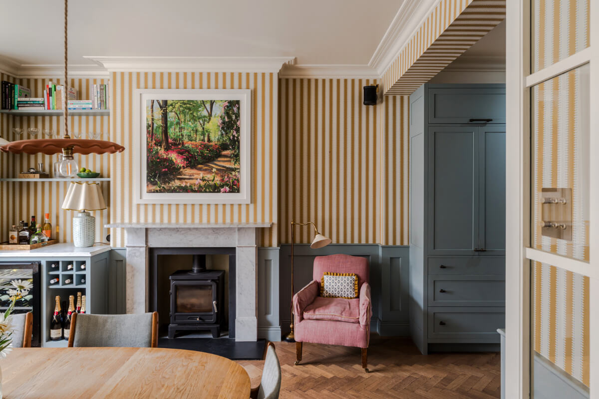 striped wallpaper herringbone floor dining room