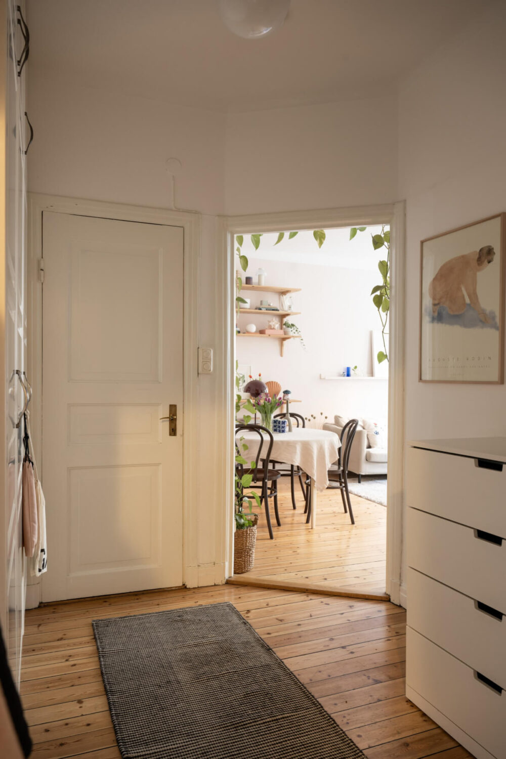 white hall wooden floor