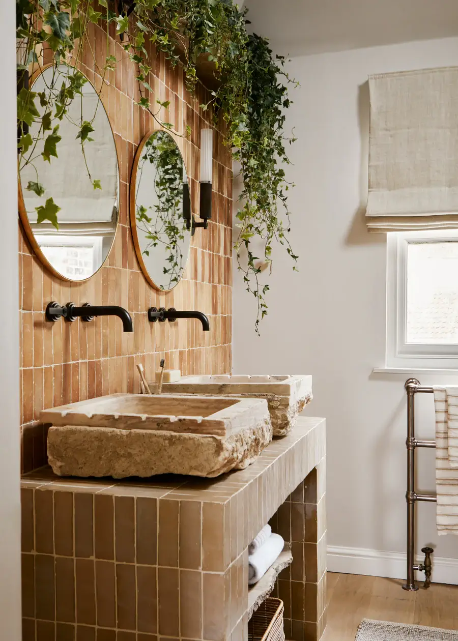 bathroom with tiles in various brown shades nordroom Pantone Color of the Year 2025: Mocha Mousse Interior Inspiration