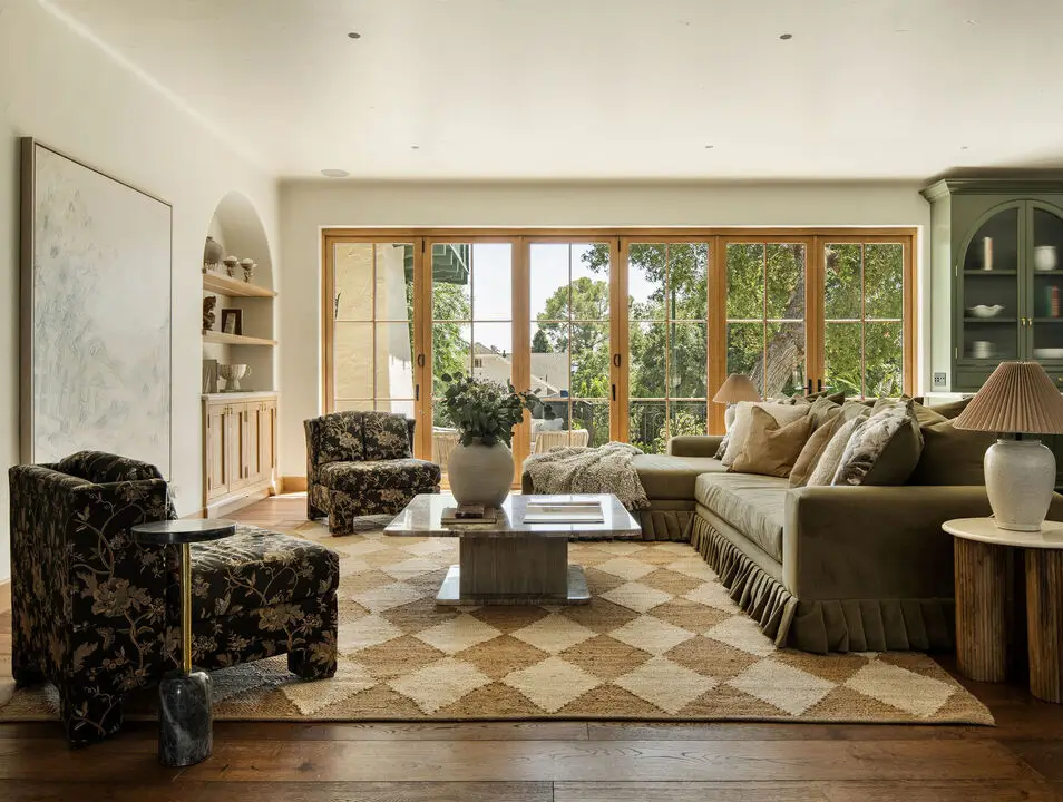 open-plan sitting room sage green color accents